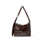 EMBOSSED LOGO LEATHER SHOULDER BAG IN BURGUNDY