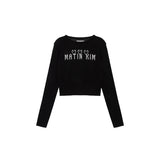 LOGO POINT JACQUARD KNIT CROP TOP IN BLACK